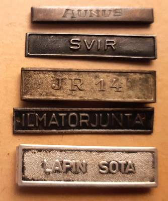Kunniamerkki nauhojen metallilätkiä