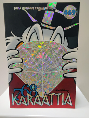 Aku Ankka taskukirja 469 768 karaattia