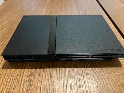 PS2 Slim SCPH-77004 / lukupää vaihdettu / pelkkä konsoli