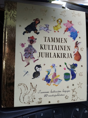 Tammen kultainen JUHLAKIRJA ( SIS POSTIKULU)