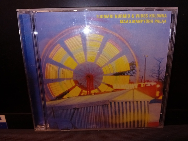 CD Tuomari Nurmio : Maailmanpyörä palaa ( SIS POSTIKULU  )