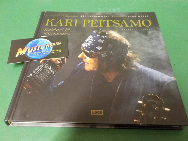 KARI PEITSANO - ROKKARI JA SAARNAMIES KIRJA NIMMARILLA
