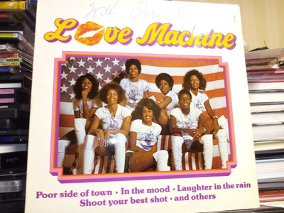 LP LOVE MACHINE ( SIGNED BY ALL MEMBERS) SIS POSTIKULU