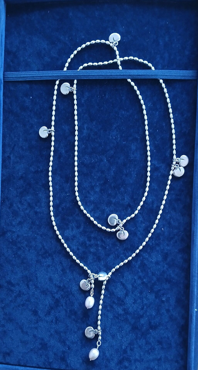 Kalevala. Vanamo-kaulakoru. Hopea.