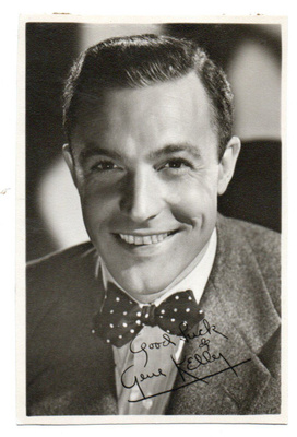 Filmitähti Gene Kelly. 1912-1996  Painettu nimikirjoitus