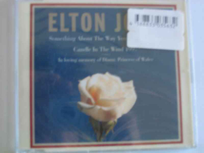 CDS ELTON JOHN-SOMETHING ABOUP UUSI MUOVEISSA EI - HV