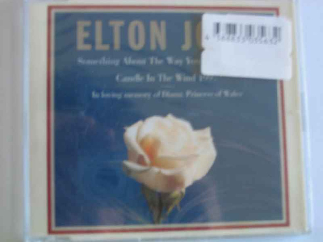 CDS ELTON JOHN-SOMETHING ABOUP UUSI MUOVEISSA EI - HV