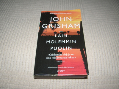 John grisham Lain molemmin puolin -nid