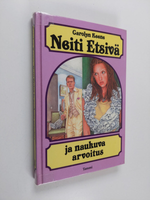 Carolyn Keene : Neiti Etsivä ja naukuva arvoitus