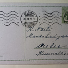 Lapsi ja kimppu rautatammen lehviä, kello, p. 1924 - pikkukuva 2