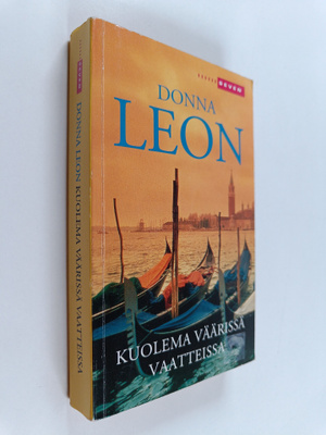 Donna Leon : Kuolema väärissä vaatteissa
