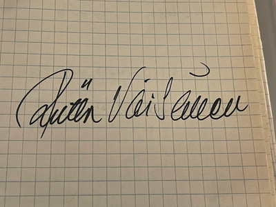 Riitta Väisänen nimikirjoitus paperilla