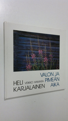 Heli Karjalainen : Valon ja pimeän aika