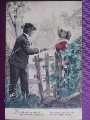 Mies pitää naista kädestä portilla WANHA 1907