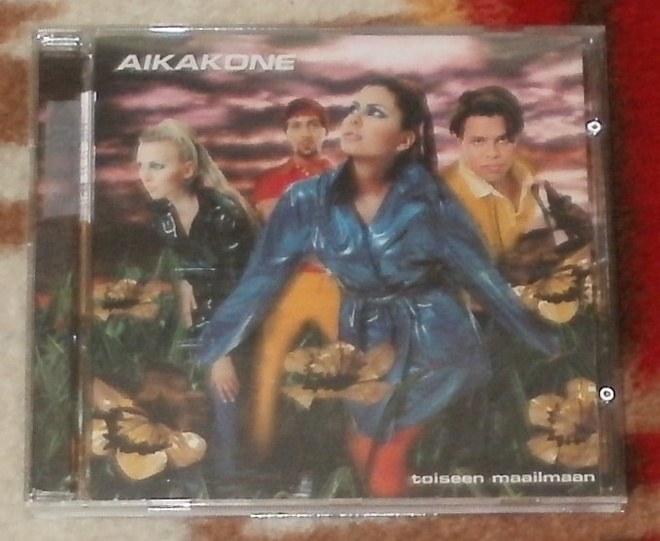 AIKAKONE ~ Toiseen Maailmaan ~ CD naarmuton
