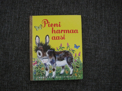 TAMMEN KULTAISET KIRJAT, PIENI HARMAA AASI no 111