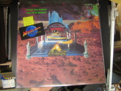 HEAVY THE WORLD - THE NEXT WORLD LP 1991 EX-/M-
