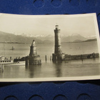 Lindau am Bodensee. Sataman sisäänkäynti.Majakka.Postikortti - pikkukuva 1