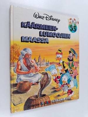 Walt Disney : Käärmeenlumoojien maassa
