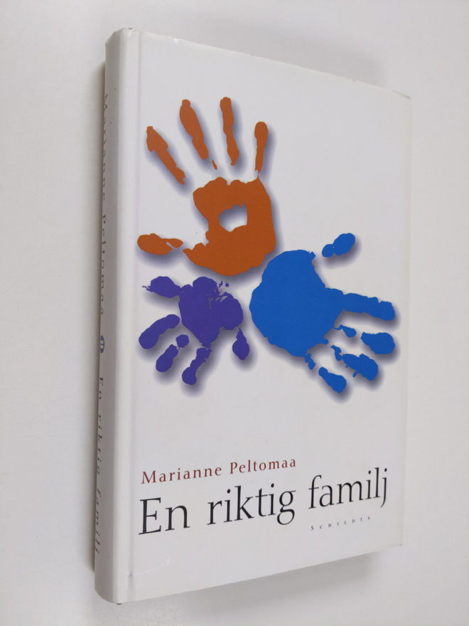 Marianne Peltomaa : En riktig familj (signeerattu)