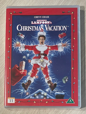Joulupuu on kärvennetty (1989) Chevy Chase (UUSI)