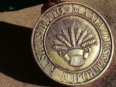 Maatalouden mitali Hopeinen, Leimoin . Kookas.