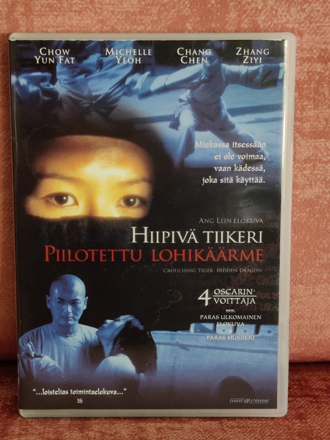 Hiipivä tiikeri piilotettu lohikäärme