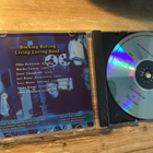 Jari Rinne & rocking rolling living band . Kaunottaria ja CD - pikkukuva 2