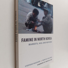 Stephan Haggard : Famine in North Korea : markets, aid an... - pikkukuva 1