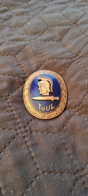Toimiupseeriliiton merkki TOUL