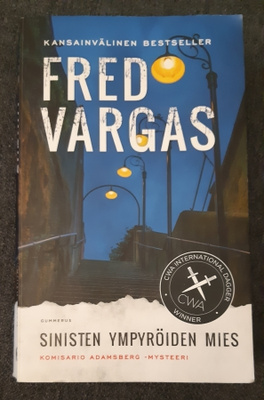 Fred Vargas - Sinisten ympyröiden mies