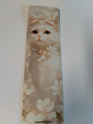 Kissa kirjanmerkki.
