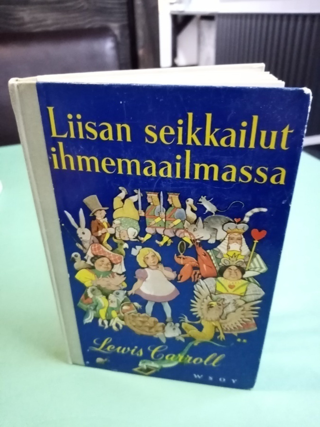 CARROLL :  LIISAN SEIKKAILUT Ihmemaailmassa ( SIS POSTIKULU
