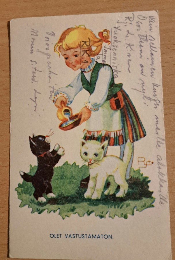Ramstedt: tyttö ruokkii kissoja, kulkenut 1945