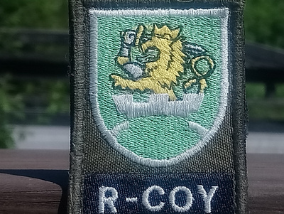 R - COY Rauhanturvaajamerkki - Kankainen hihamerkki . Koko