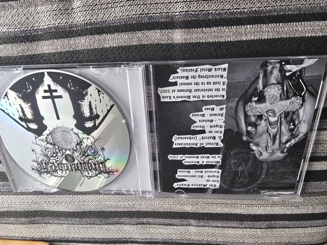 Drowning the Light – The Masters Intolerant Empire CD – SIGN
