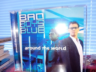 CD Bad Boys Blue :  Around the World ( SIS POSTIKULU)