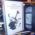 VHS Kari piirrospöydän ääressä ( SIS POSTIKULU ) - pikkukuva 1