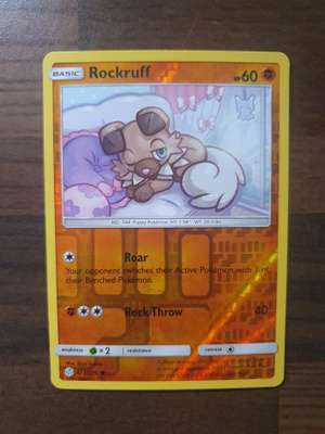 Pokemon Rockruff 123/236 Reverse holo
