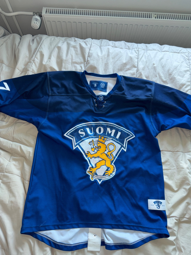 Otsikko: Suomi Leijonat Warrior Game Worn pelipaita #7 – 201
