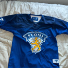 Otsikko: Suomi Leijonat Warrior Game Worn pelipaita #7 – 201 - pikkukuva 1