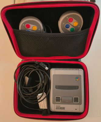 Nintendo classic mini SNES + kantolaukku & jatkojohto