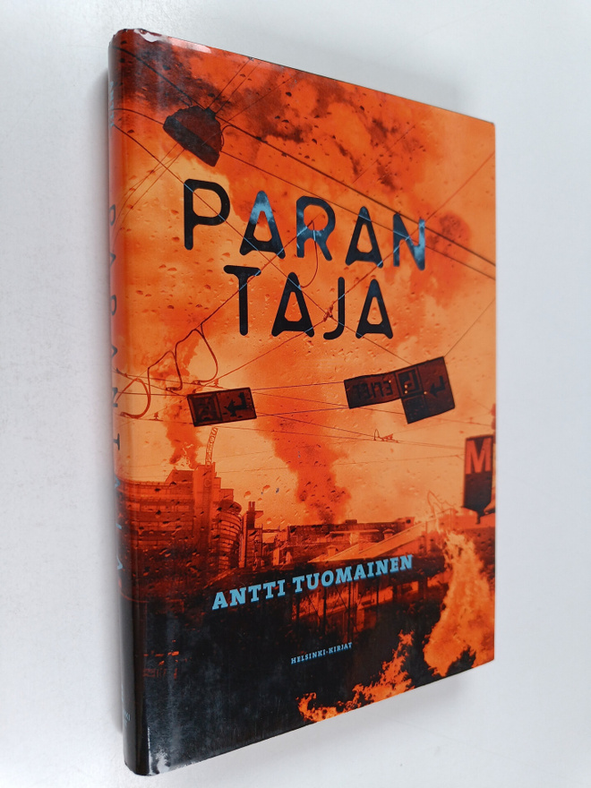 Antti Tuomainen : Parantaja (signeerattu, tekijän omiste)