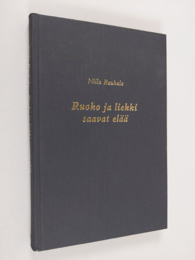 Niilo Rauhala : Ruoko ja liekki saavat elää : runoja