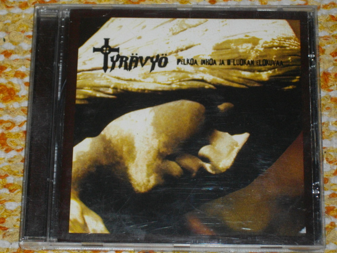 CD - TYRÄVYÖ - Pelkoa,Inhoa ja B-luokan Elokuvaa  2002 MINT-