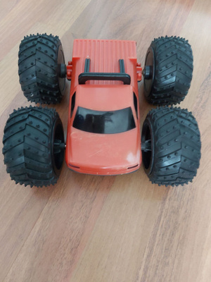 Monsteriauto 2-puolinen punainen sininen