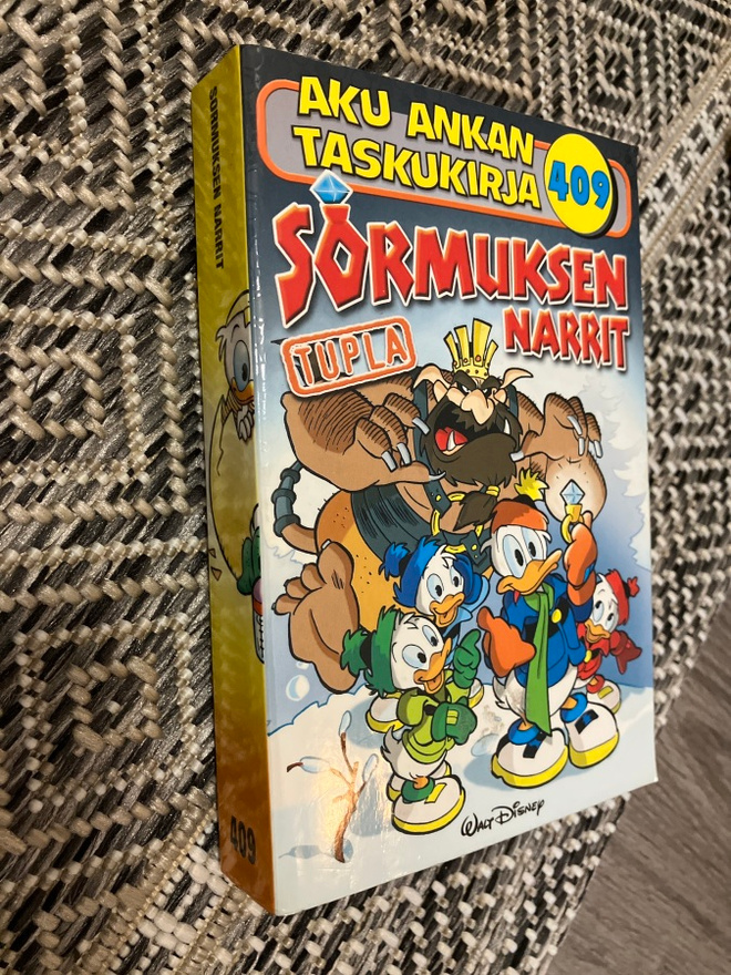 Aku Ankan taskukirja 409 Sormuksen narrit
