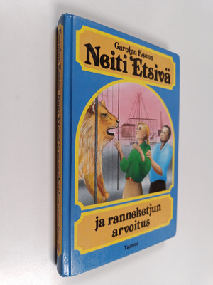 Carolyn Keene : Neiti Etsivä ja ranneketjun arvoitus