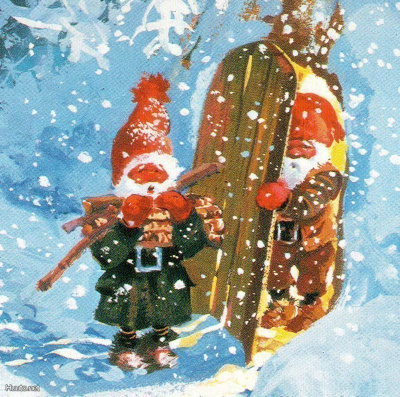 TONTTU / Tonttu tuo lumipyryssä tupaan halkoja.
