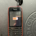 Nokia 203 + laturi - pikkukuva 1